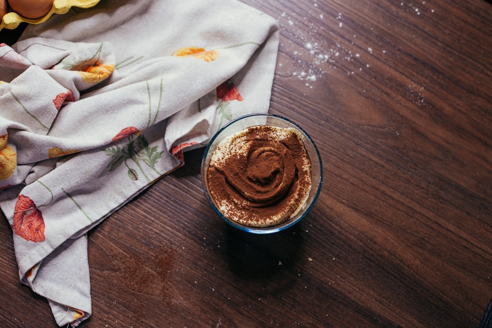 a cup of coffee on a table