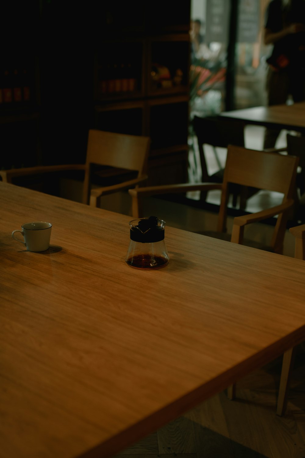 a small glass jar on a table