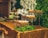 A luxurious dessert table featuring an array of premium pastries and decorative elements.