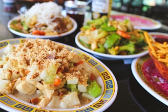 a table full of plates of food