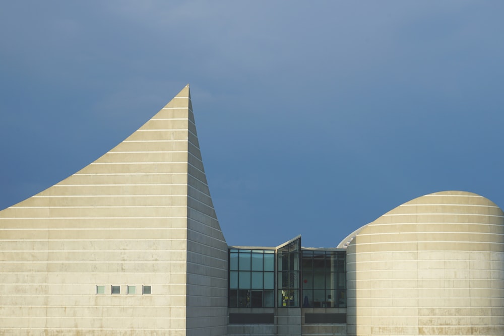 a building with a triangular roof