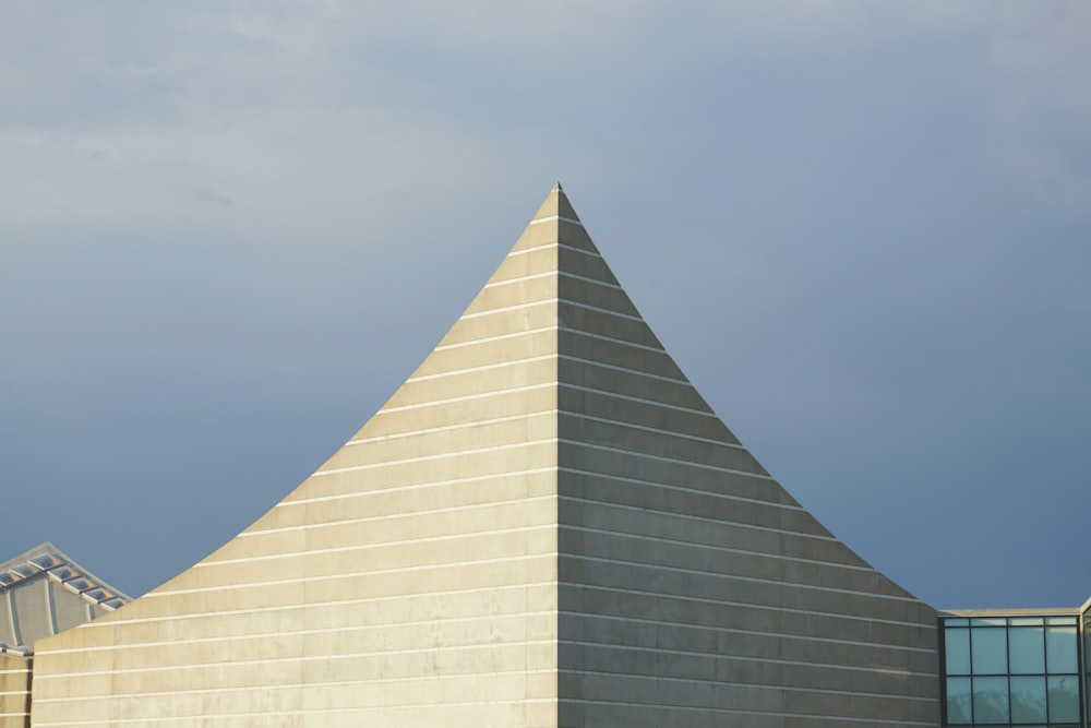 a building with a triangular roof