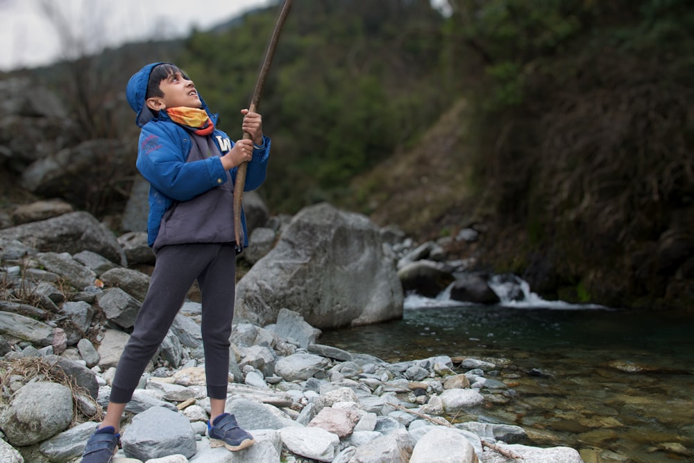 a person holding a fishing pole