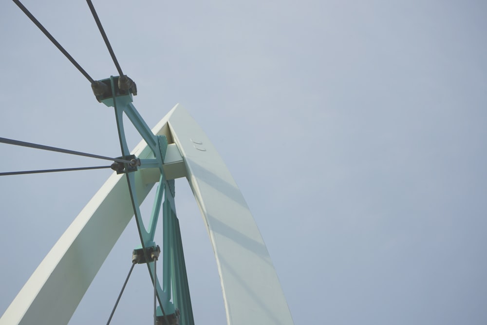 a white and green windmill