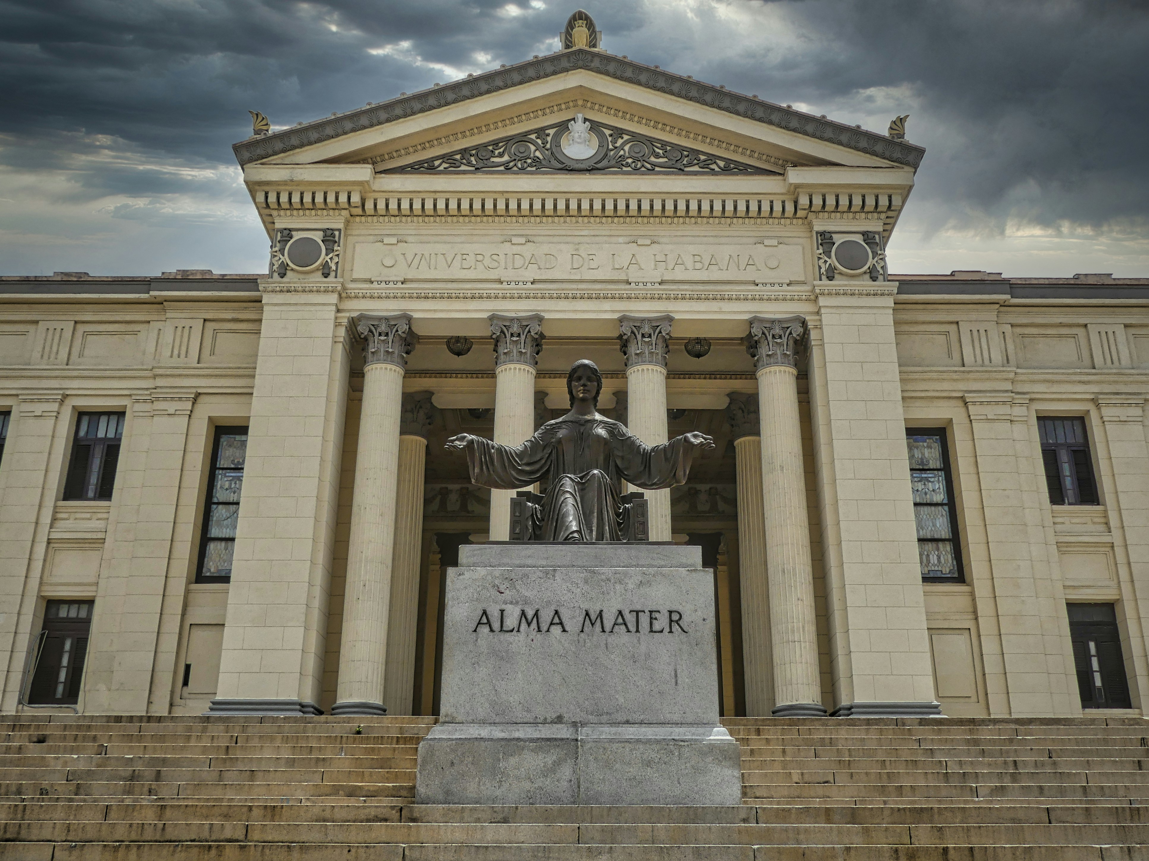 a statue in front of a building