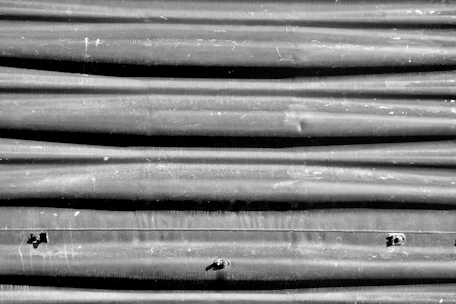 Close-up of galvanized steel products showing smooth, protective coating ready for delivery.