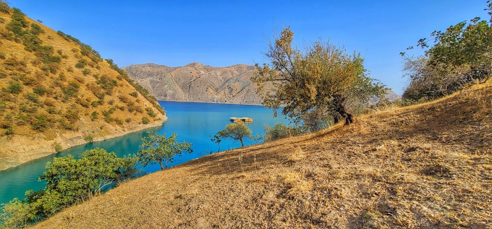 a lake surrounded by hills