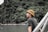 a person standing on a bridge