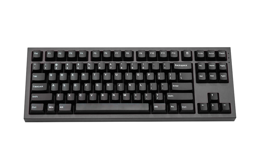 a black keyboard with a white background