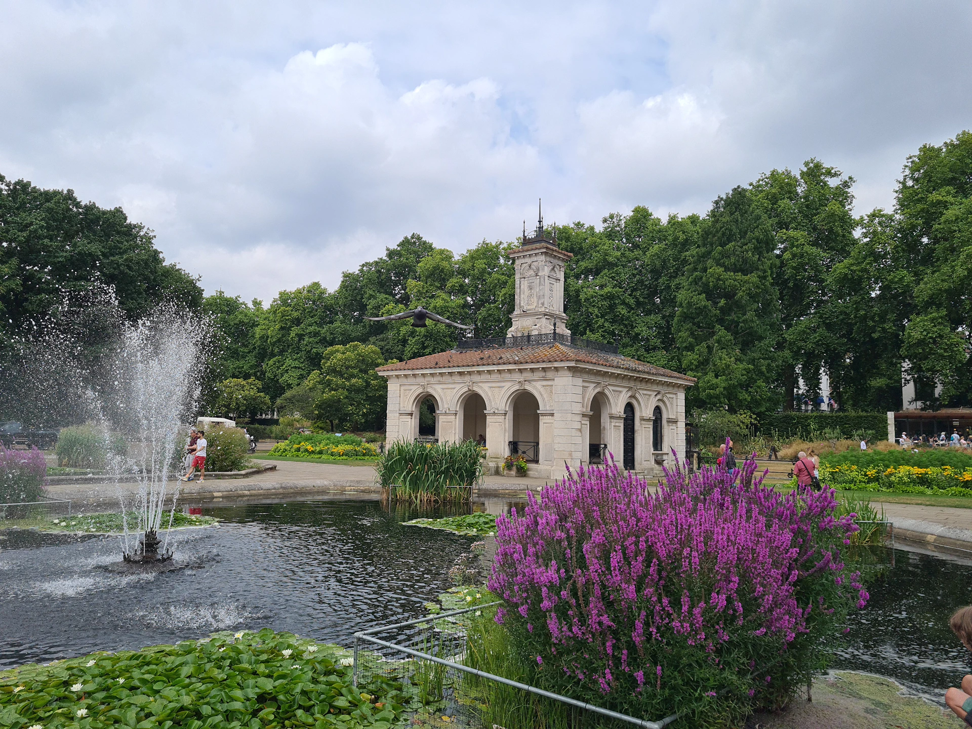 a fountain in front of a building