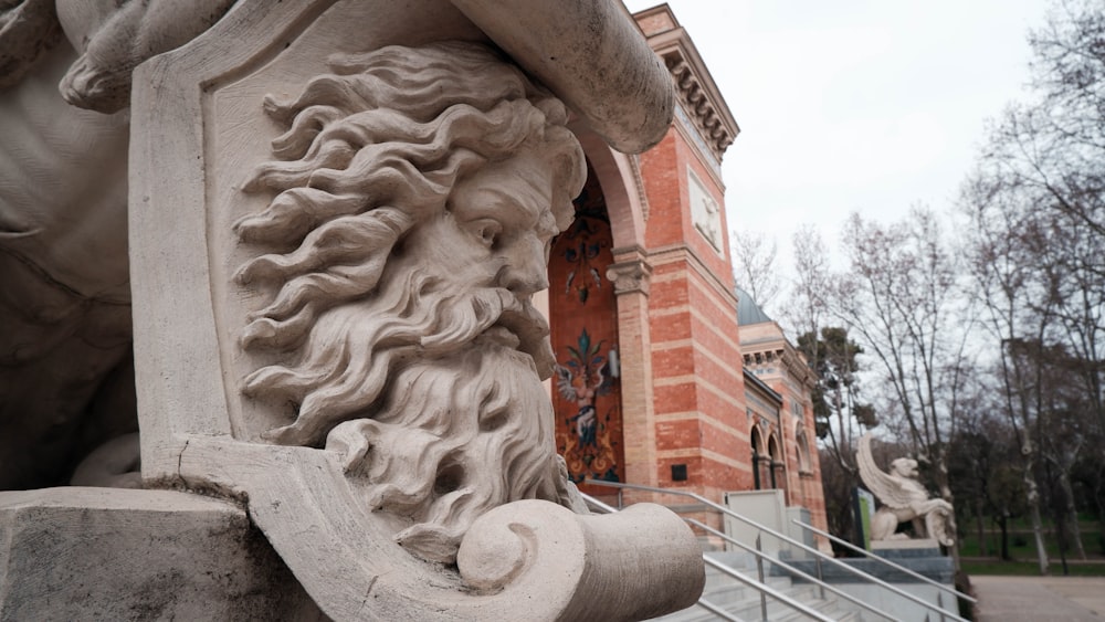 a stone statue of a lion