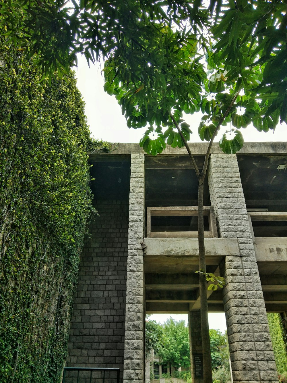 a brick building with a stone wall