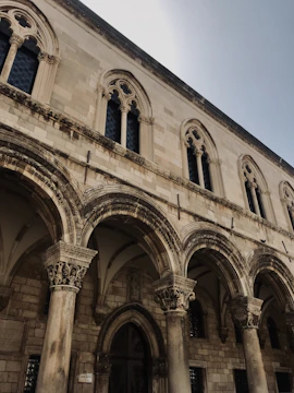 Historic colonial building facade in Puebla with intricate stonework.