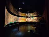 Interactive digital displays showcasing Batur heritage artifacts