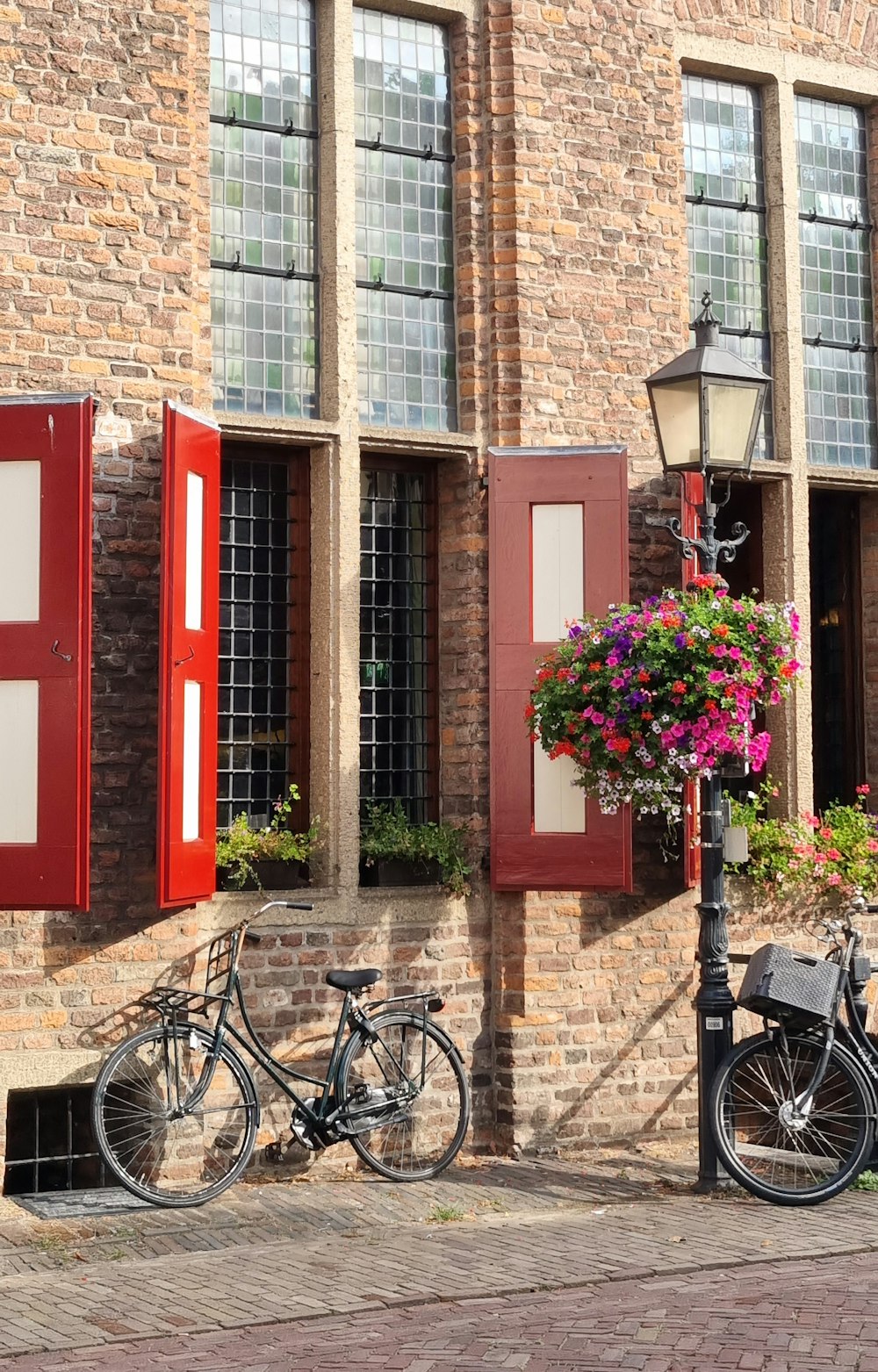 bicycles parked in front of a building