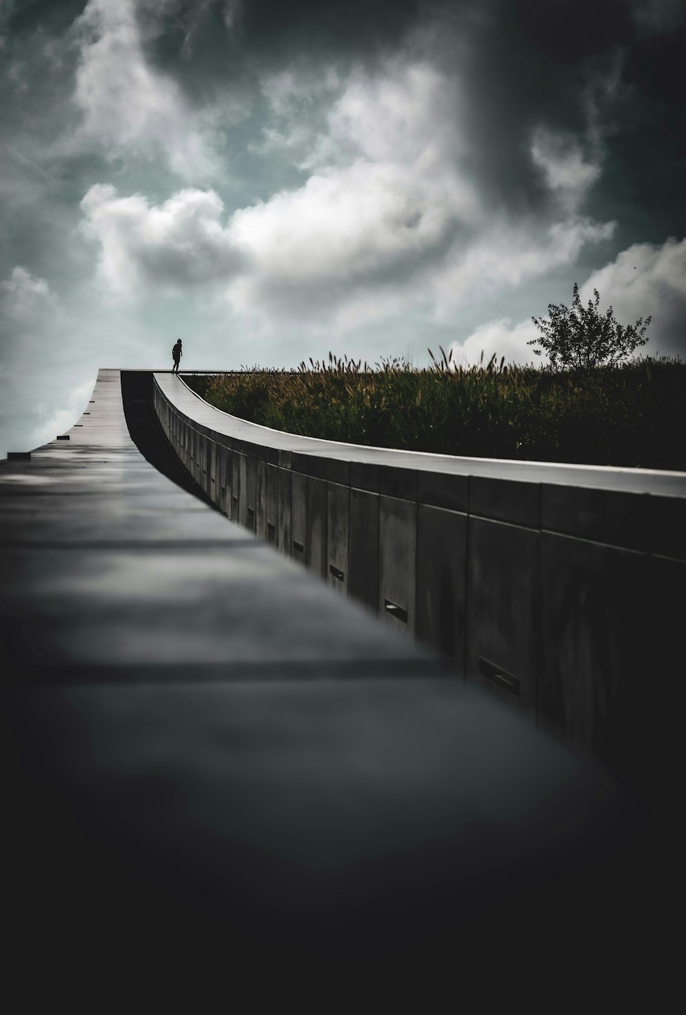 a person walking on a bridge