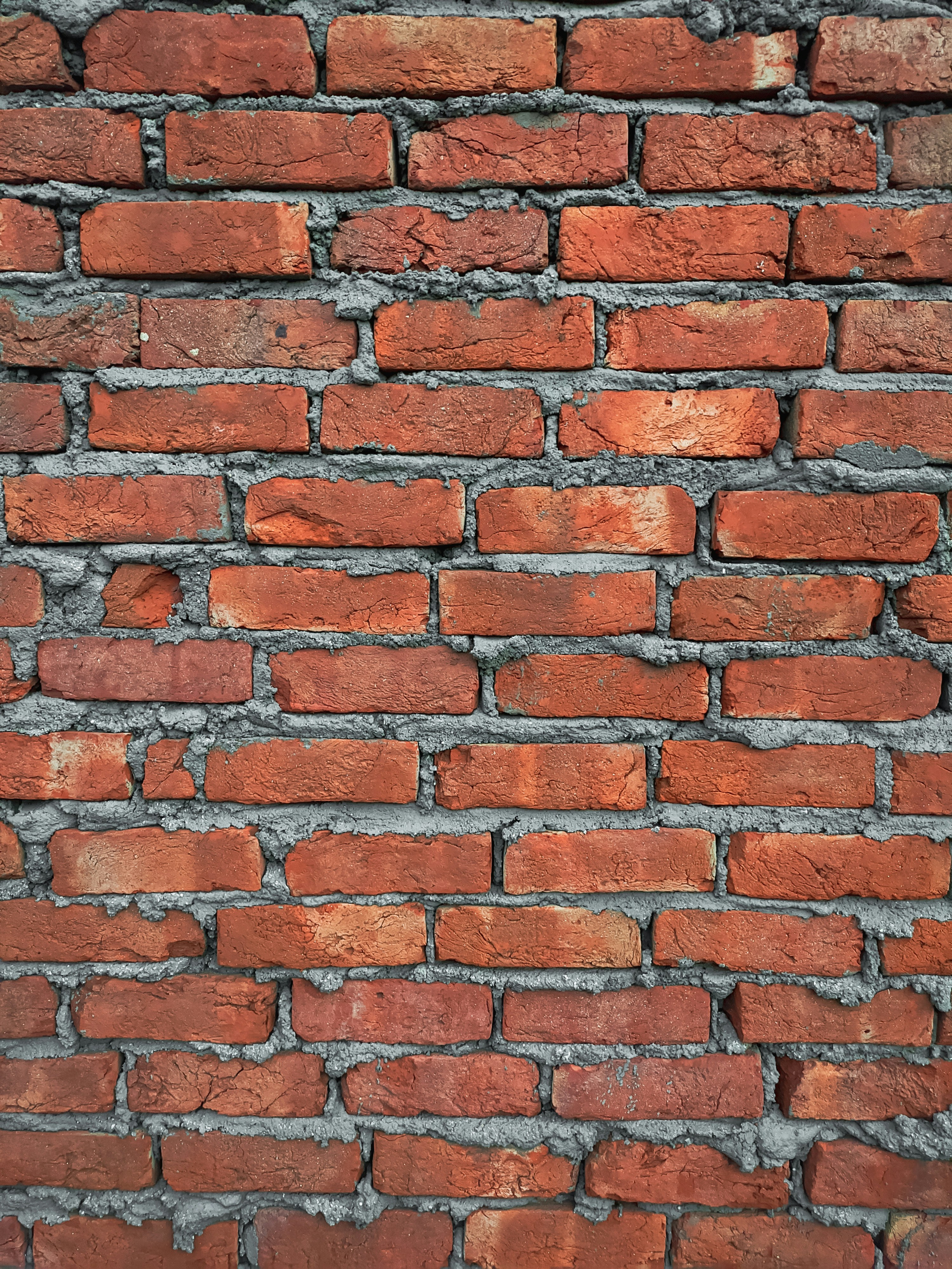 A brick wall with a brick wall photo Free Bricks wall Image on Unsplash