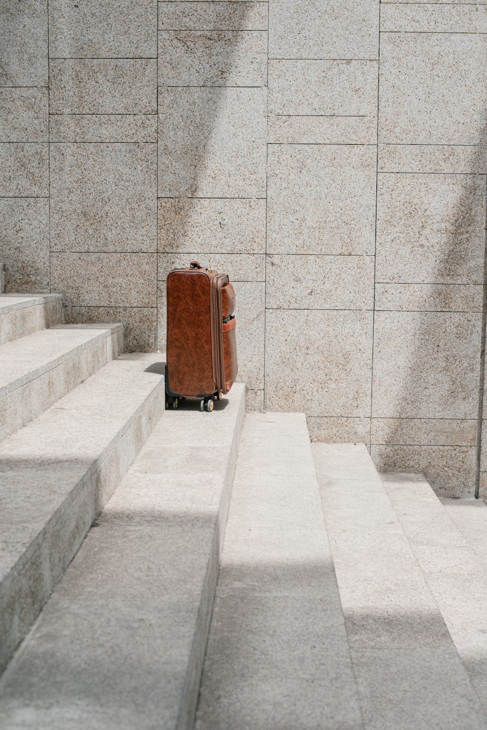a suitcase on a staircase