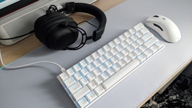 a keyboard and mouse on a desk