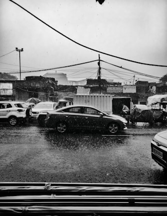A gloomy street scene in Thailand during a heavy rainstorm.