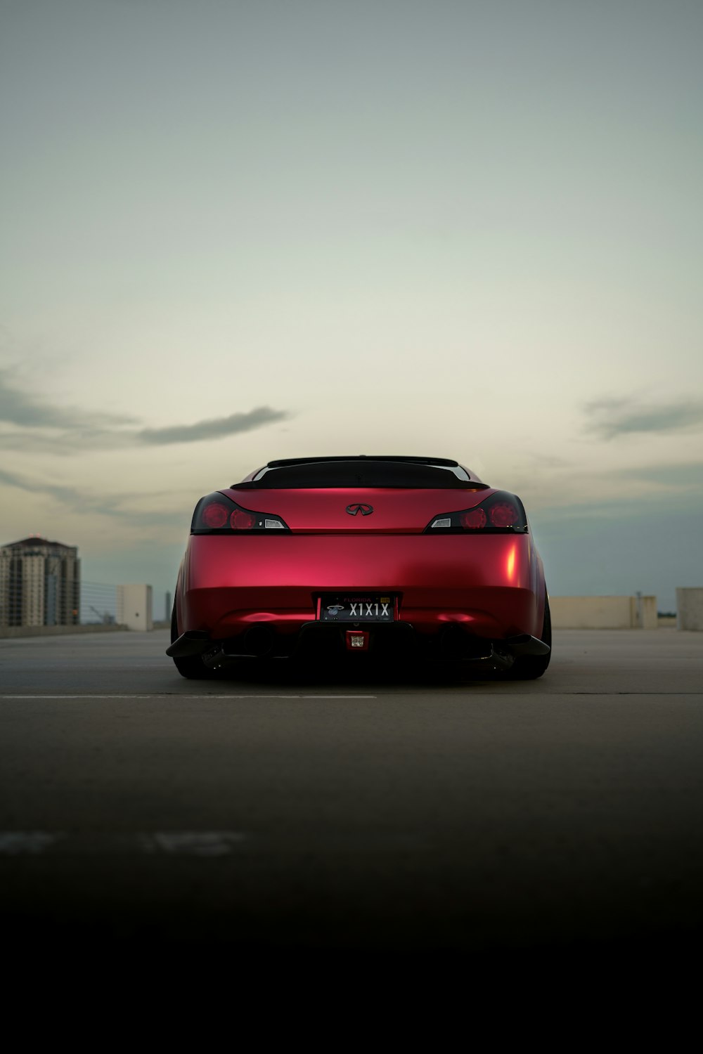 a red sports car on a road