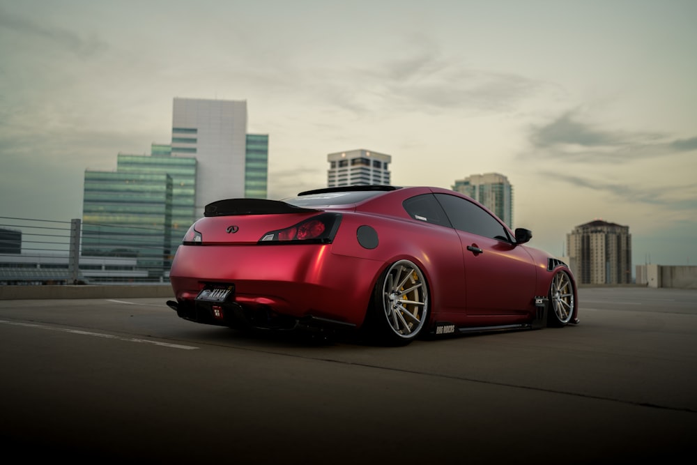 a red sports car on a road