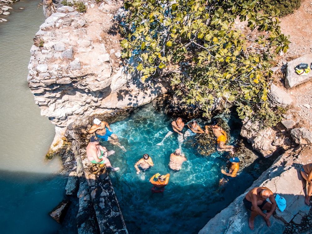 a group of people in a pool