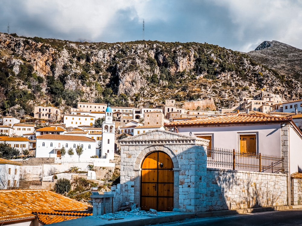 a town with a hill in the background