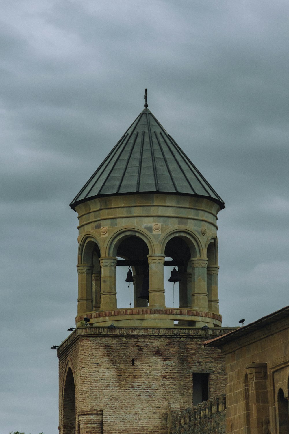 a bell tower with a bell