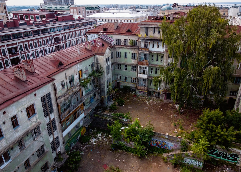 a group of buildings with trees