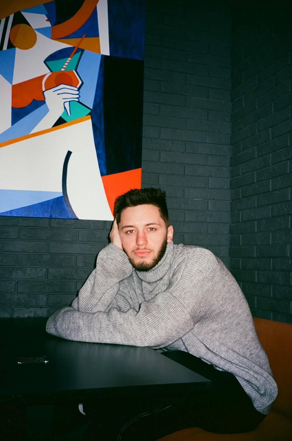 a man sitting at a table