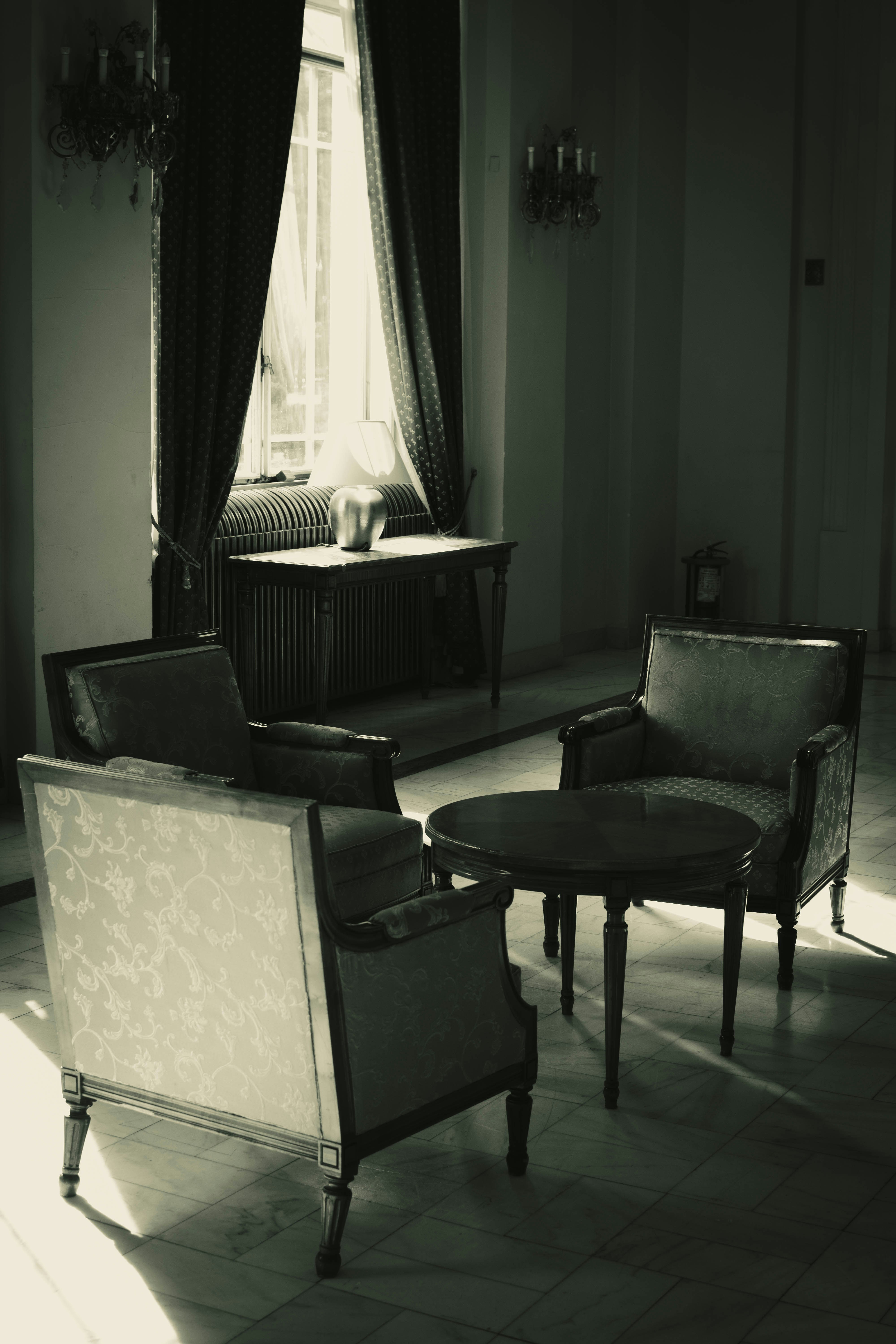 a room with chairs and a table