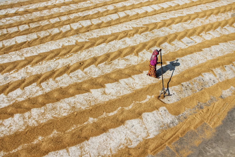 a person walking in a field