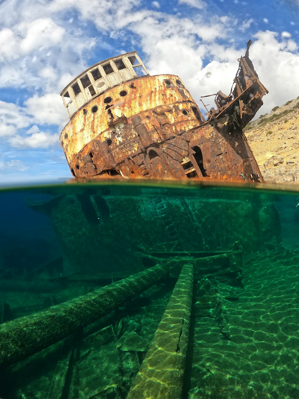 a large building on top of a green water body