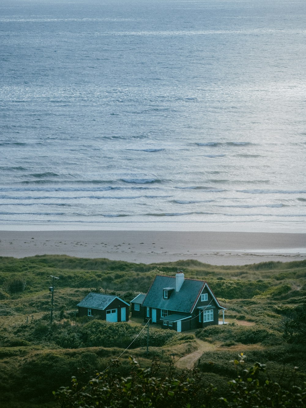 a group of houses by the water