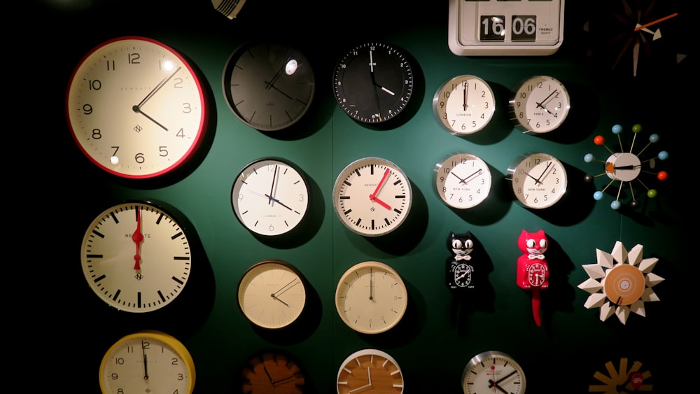 a wall full of clocks