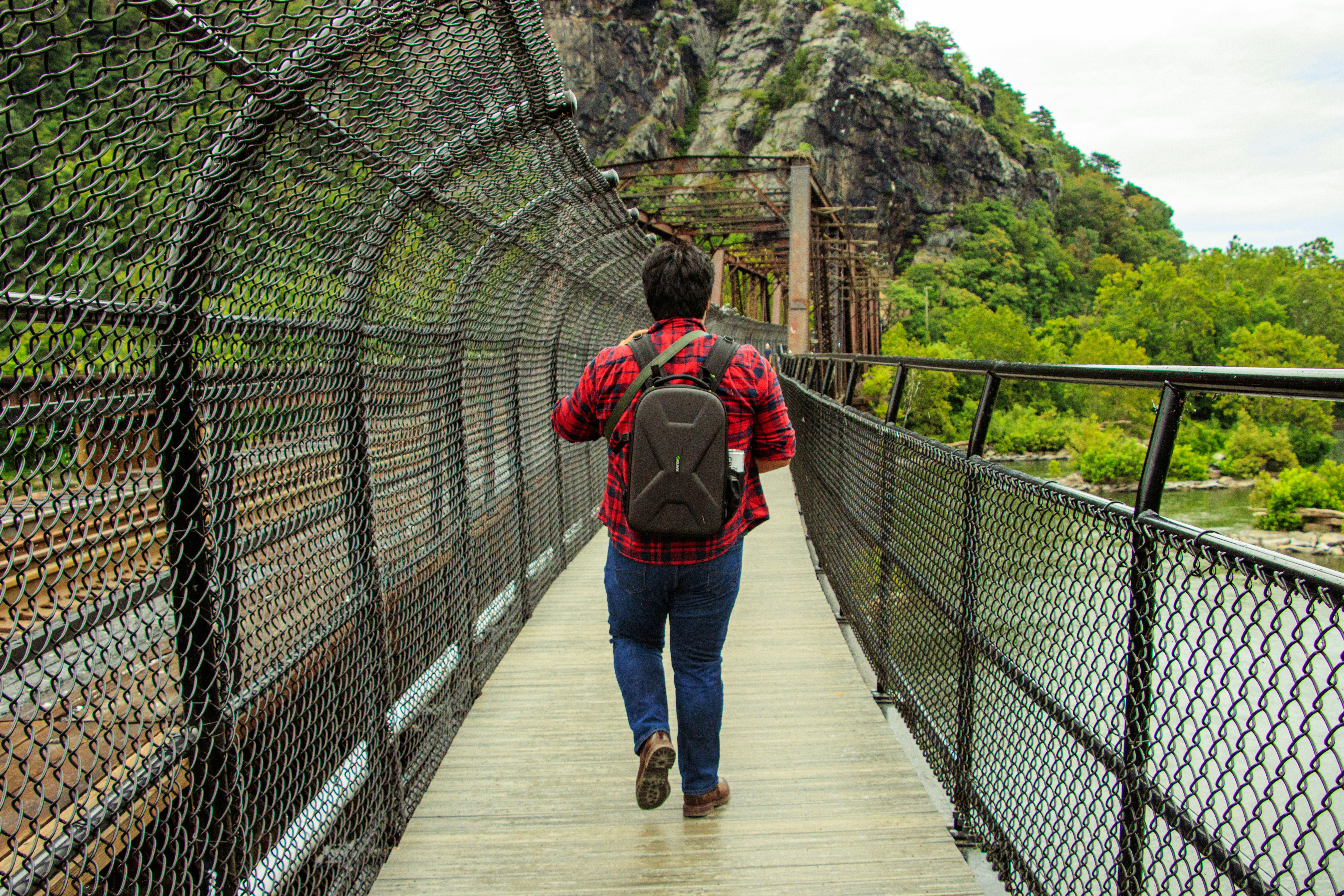 a person walking on a bridge