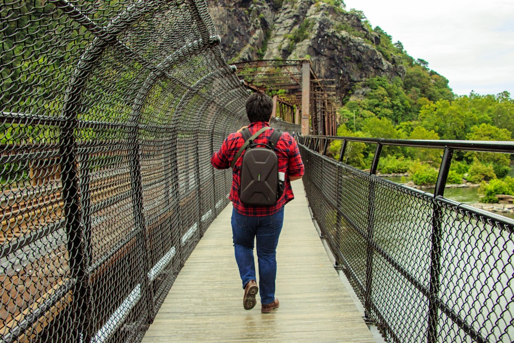 a person walking on a bridge