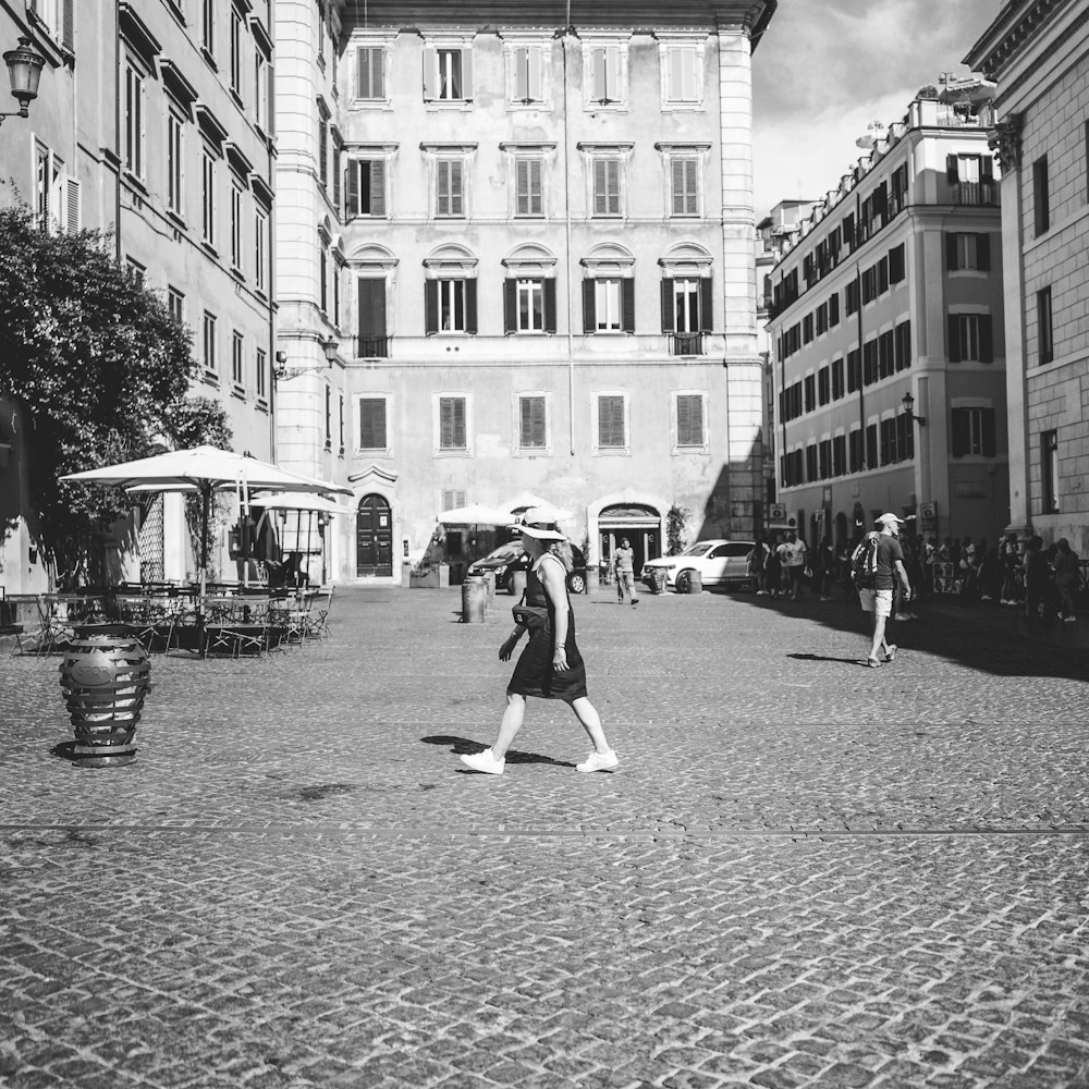 a man walking with an umbrella