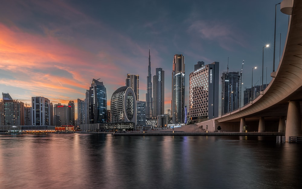 a city skyline at sunset