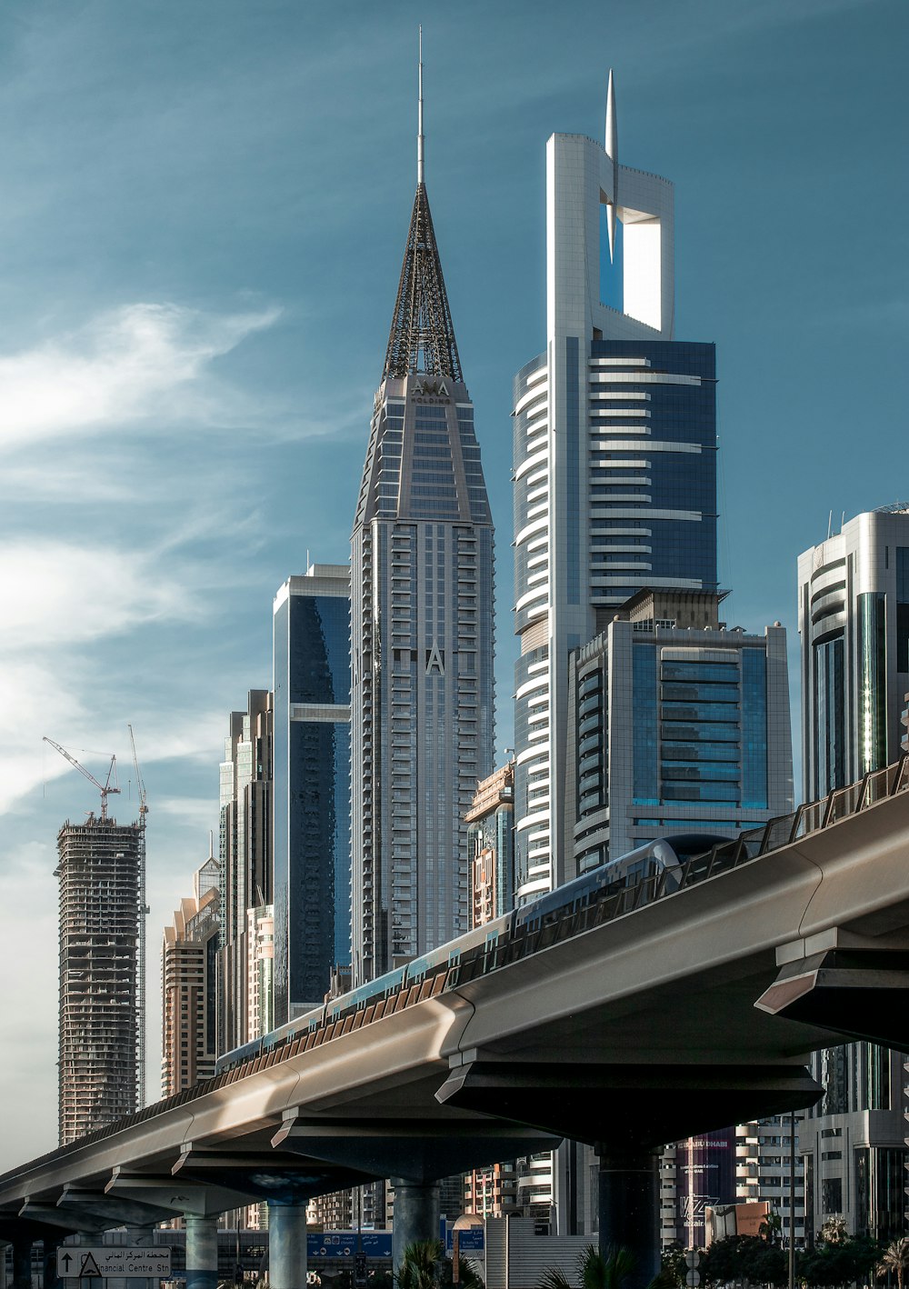 a bridge leading to a city