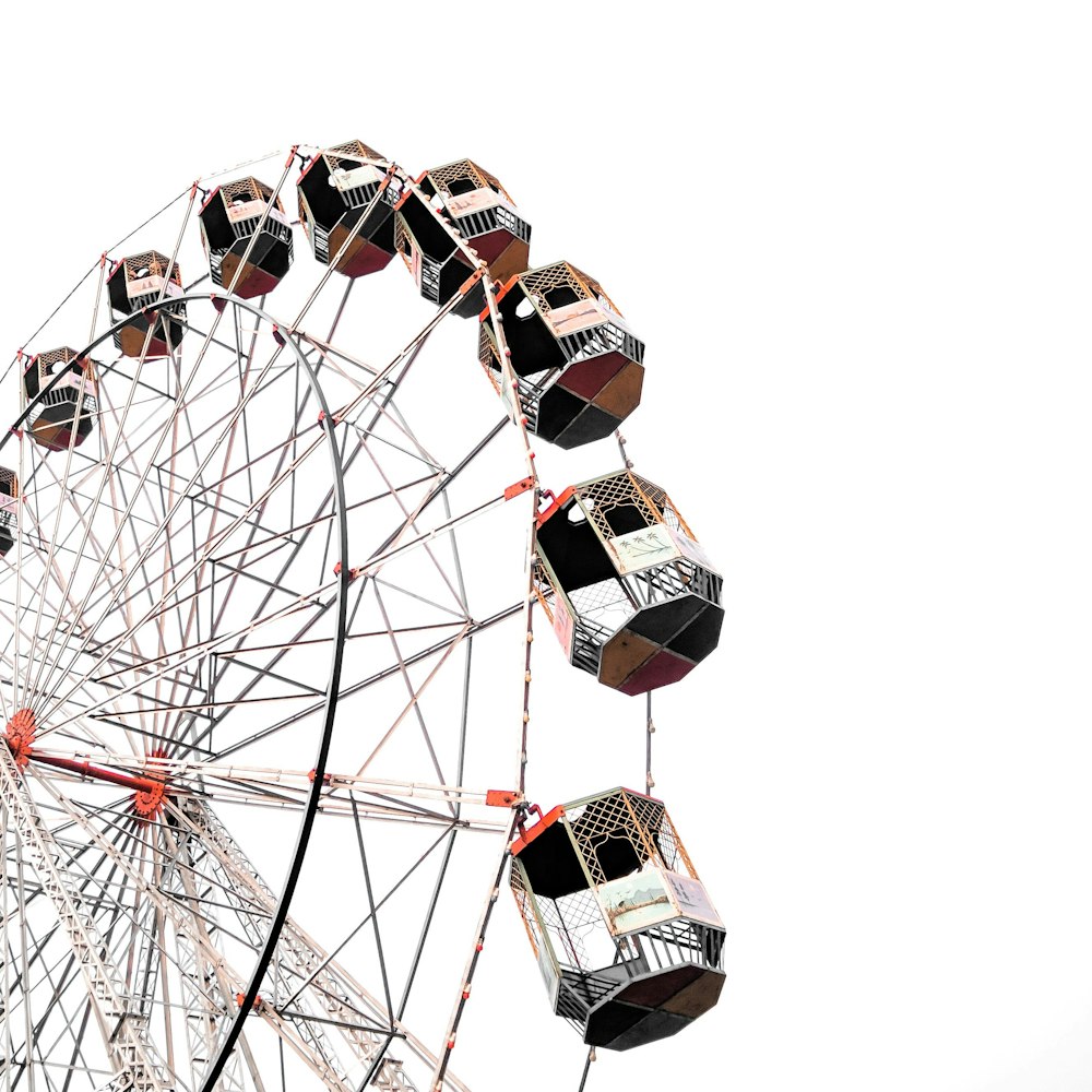 a ferris wheel with a few seats