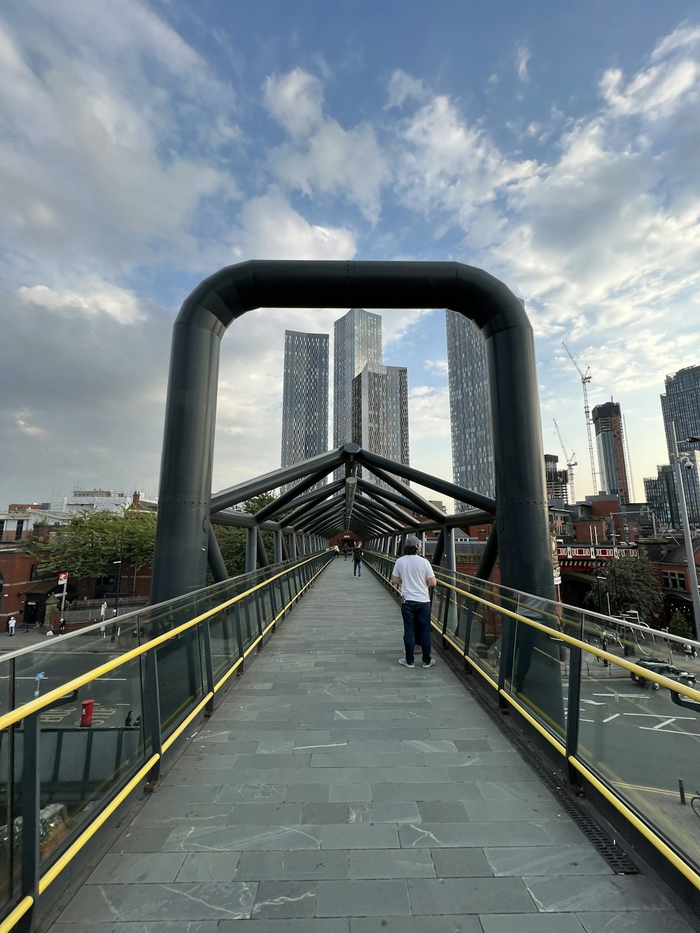 a person walking on a bridge