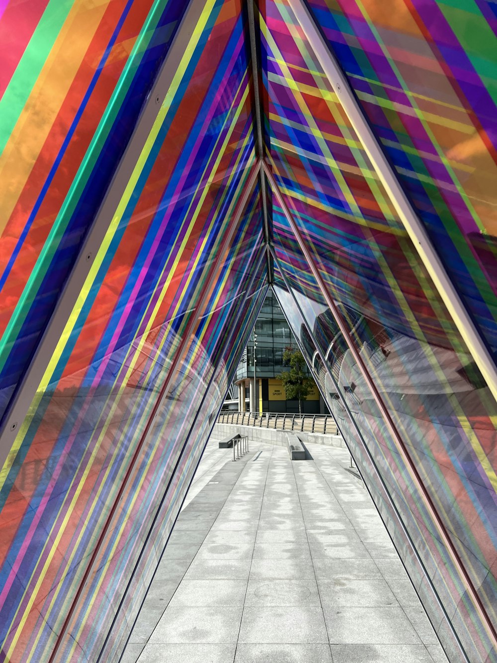 a tunnel with colorful walls