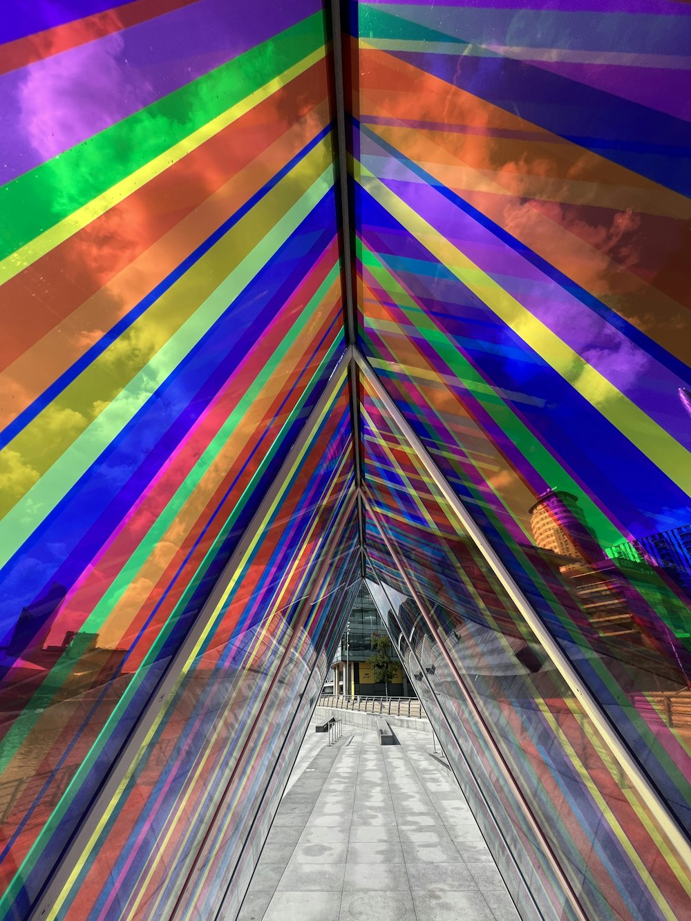 a tunnel with rainbows