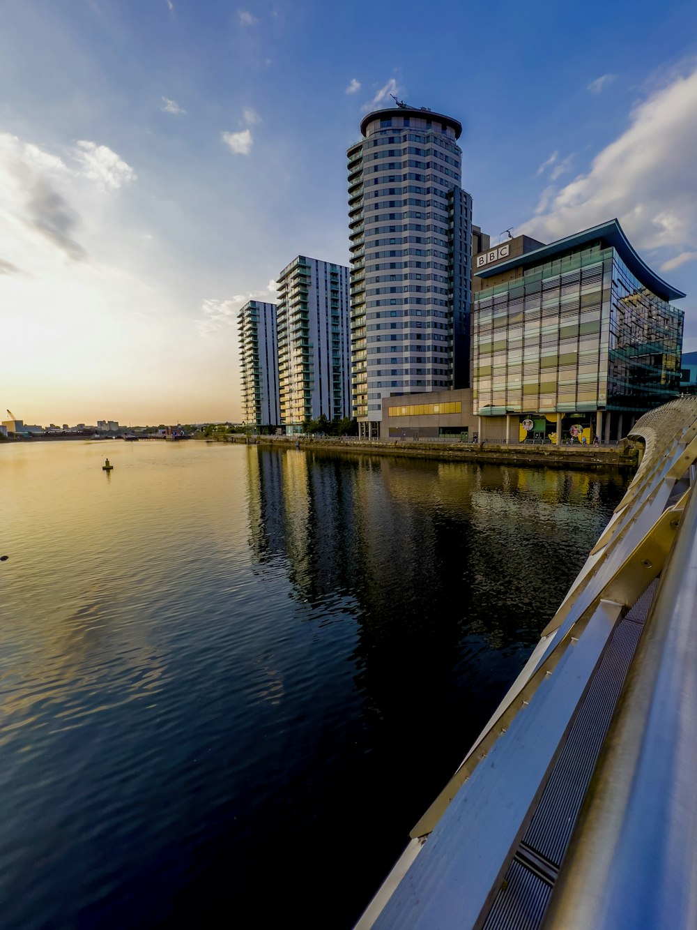 a body of water with buildings along it