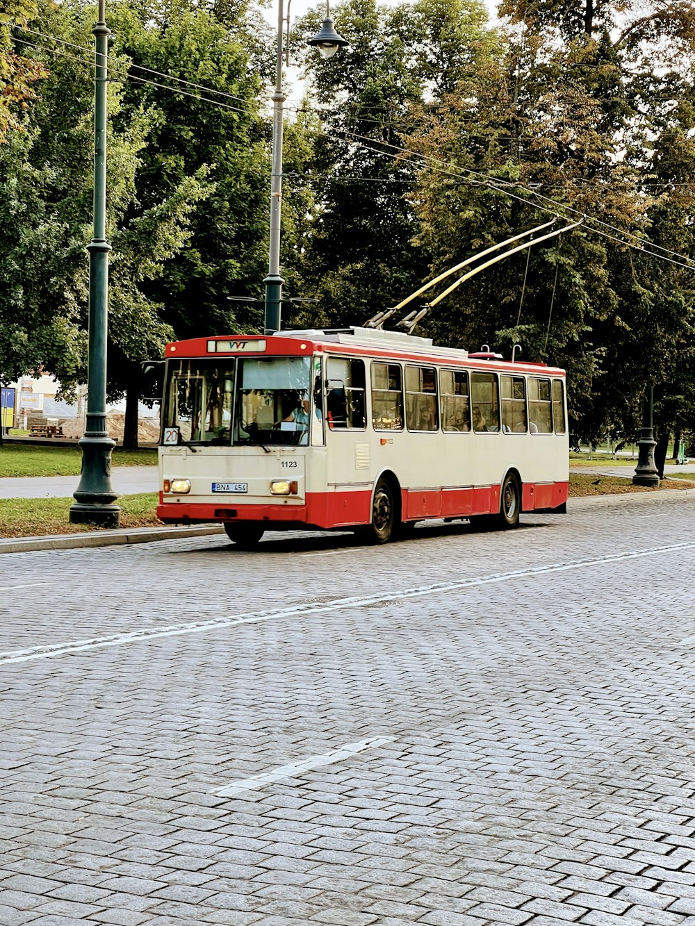 a bus travels down the street