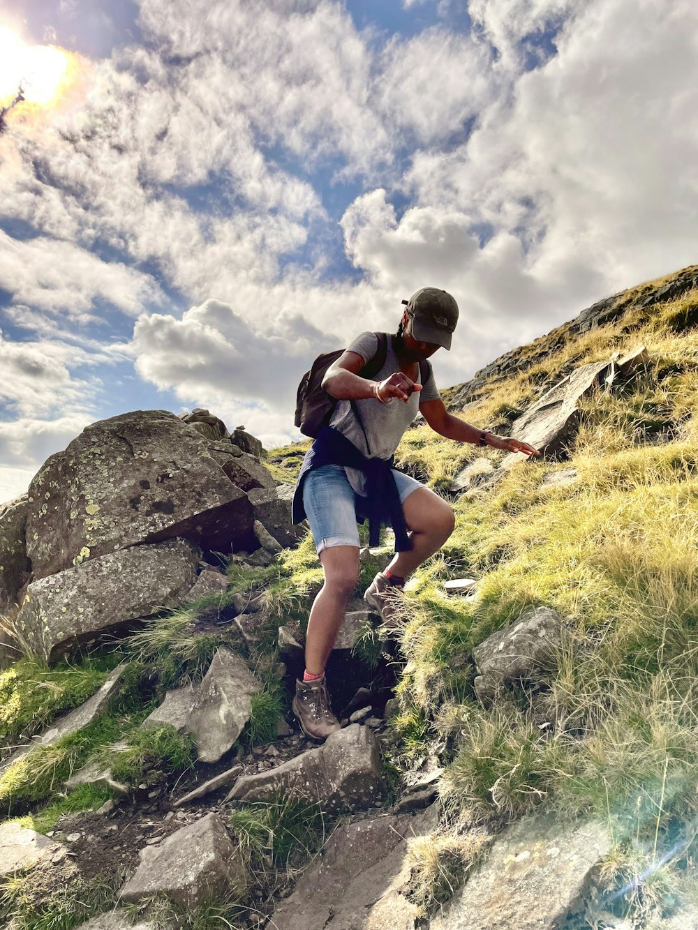 a man climbing a mountain