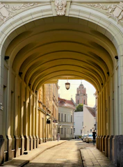 a walkway with a building in the background