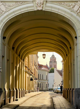a walkway with a building in the background